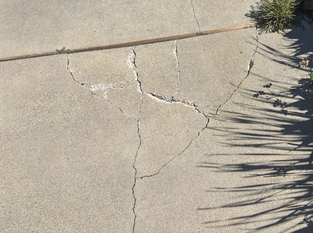 Before Concrete driveway crack repair Escondido, C