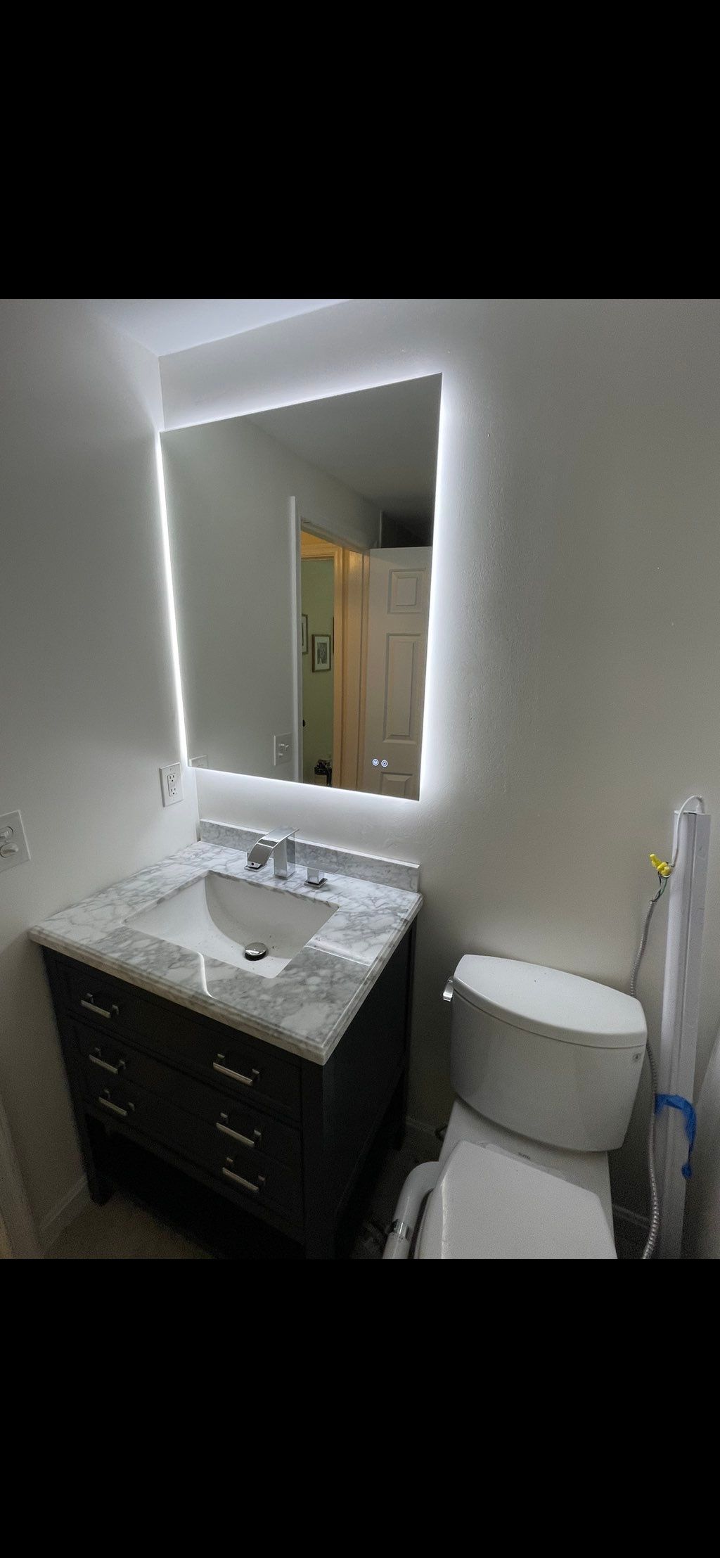 (AFTER)(Installed a mirror )and new (vanity) with 