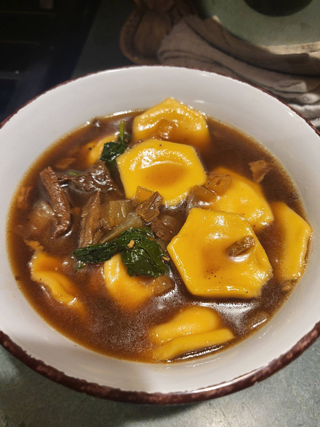 Sweet Potato Pelmeni, spinach, porcini & black pep