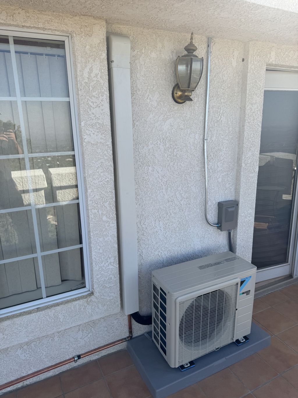 Mini Split Installation on a 2nd Story Balcony