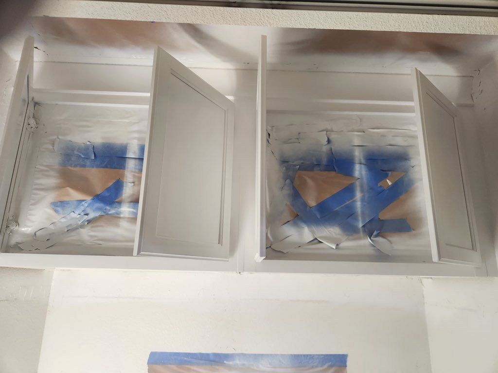 Installed and painted cabinets (mid-process) 