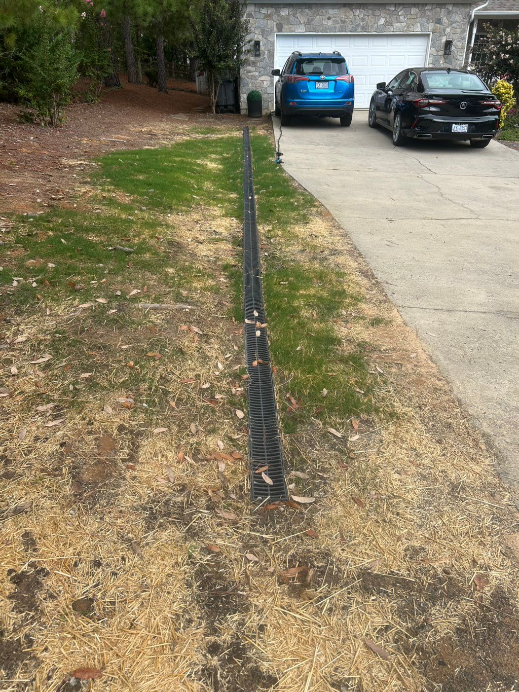 50’ French drain with 5x  4’ deep soak outs, trick