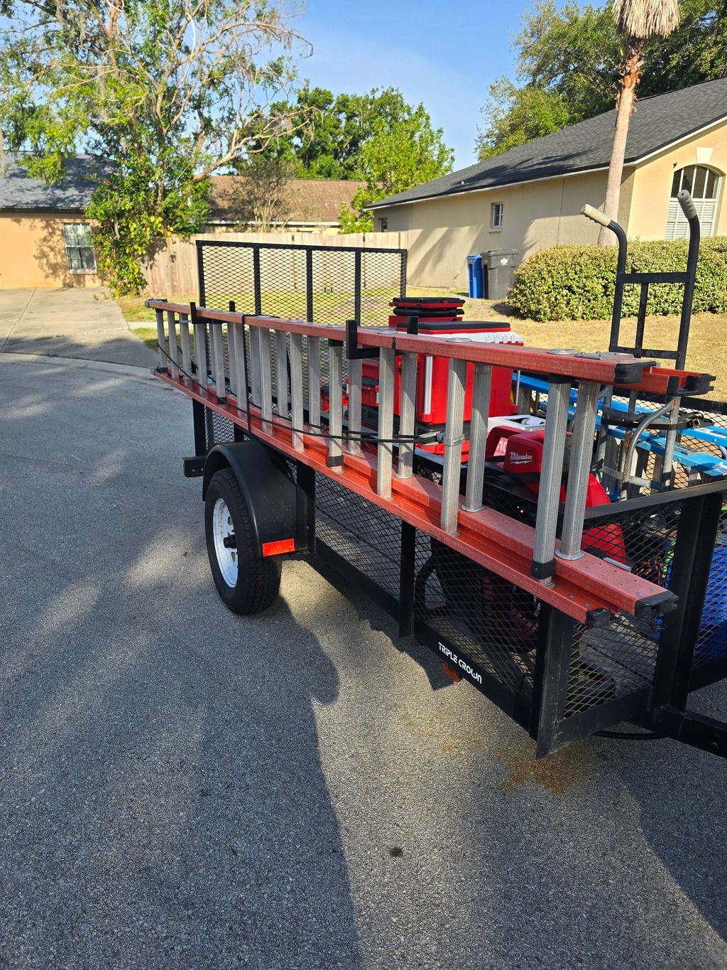 Removable ladder rack for utility trailer