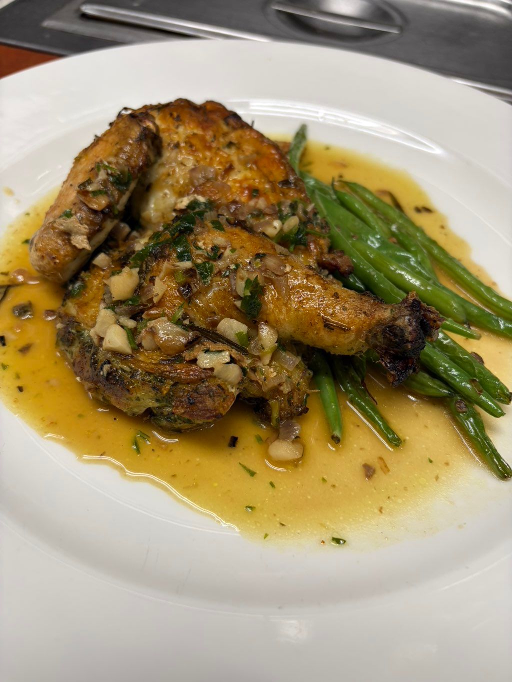 Half Chicken With A Garlic As Jus