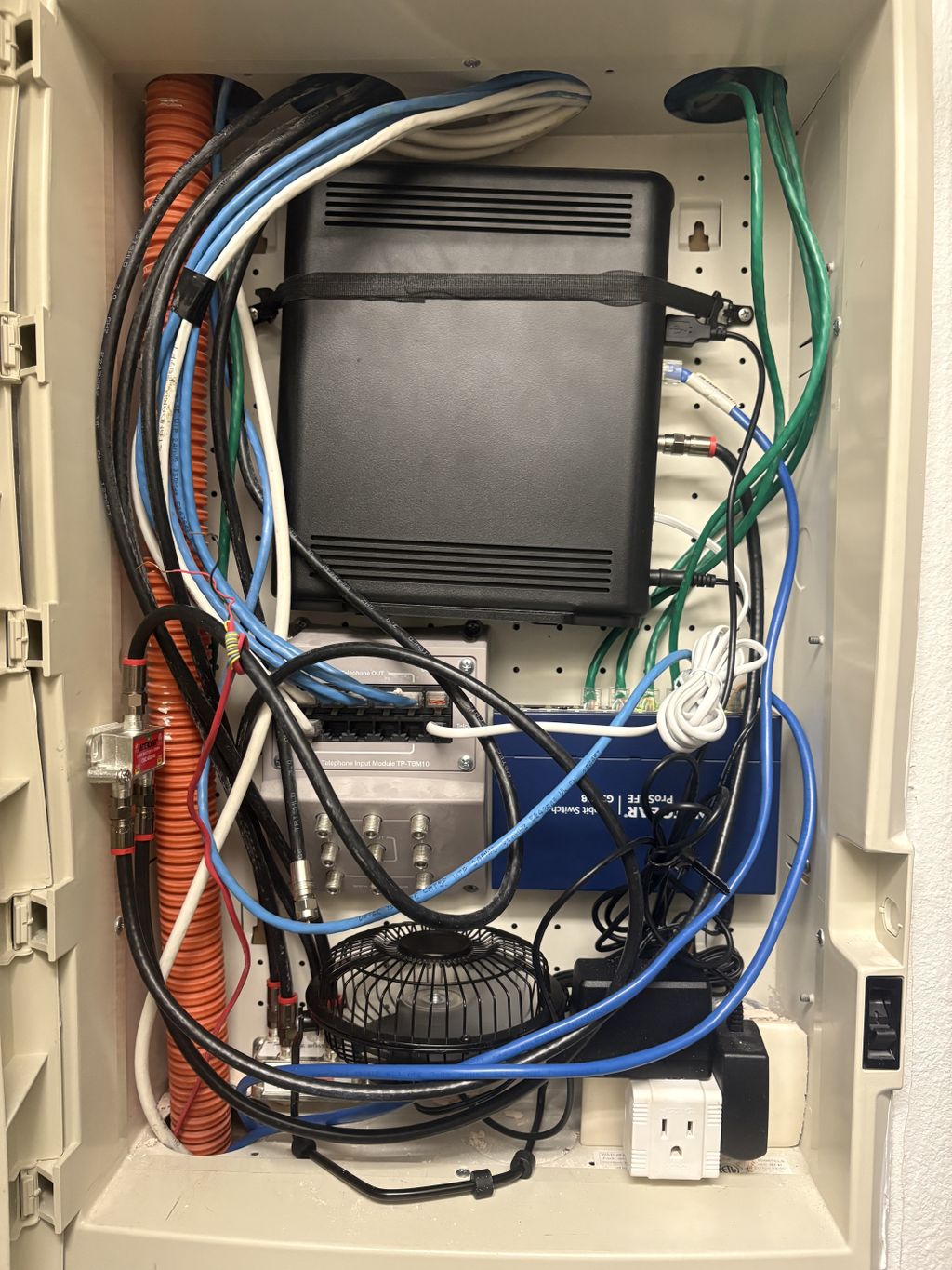 After cleaning up the modem, placed a quiet fan to