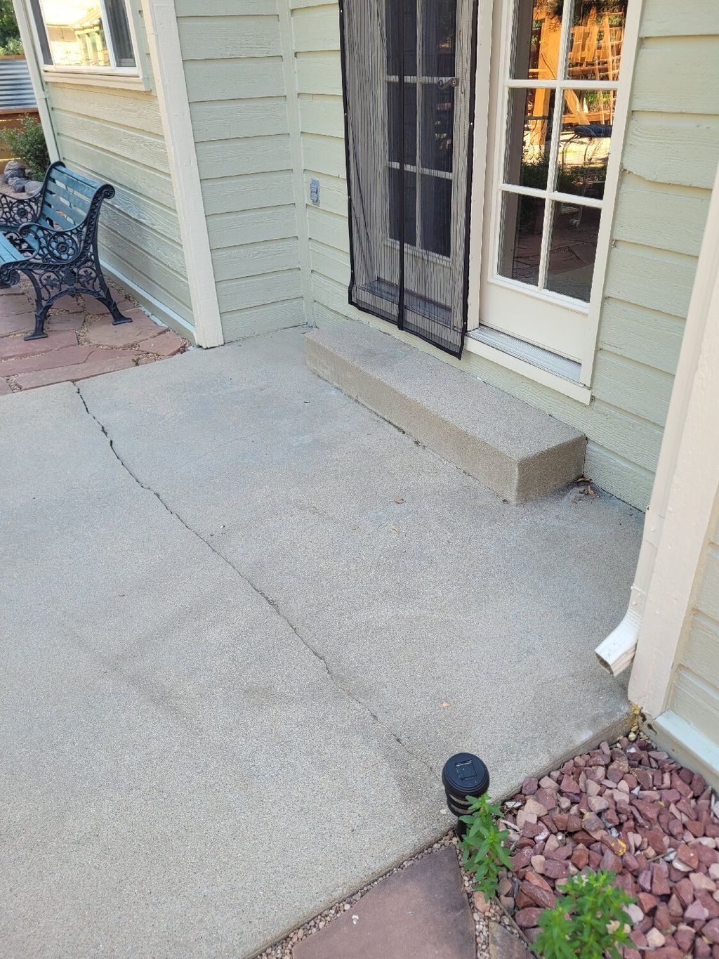 This back patio sank over time causing the slab to