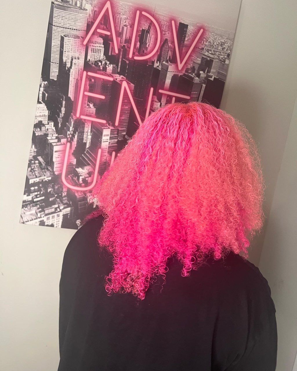 Brown and blonde hair colored pink 