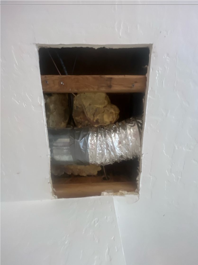 Water damage hole in bedroom ceiling