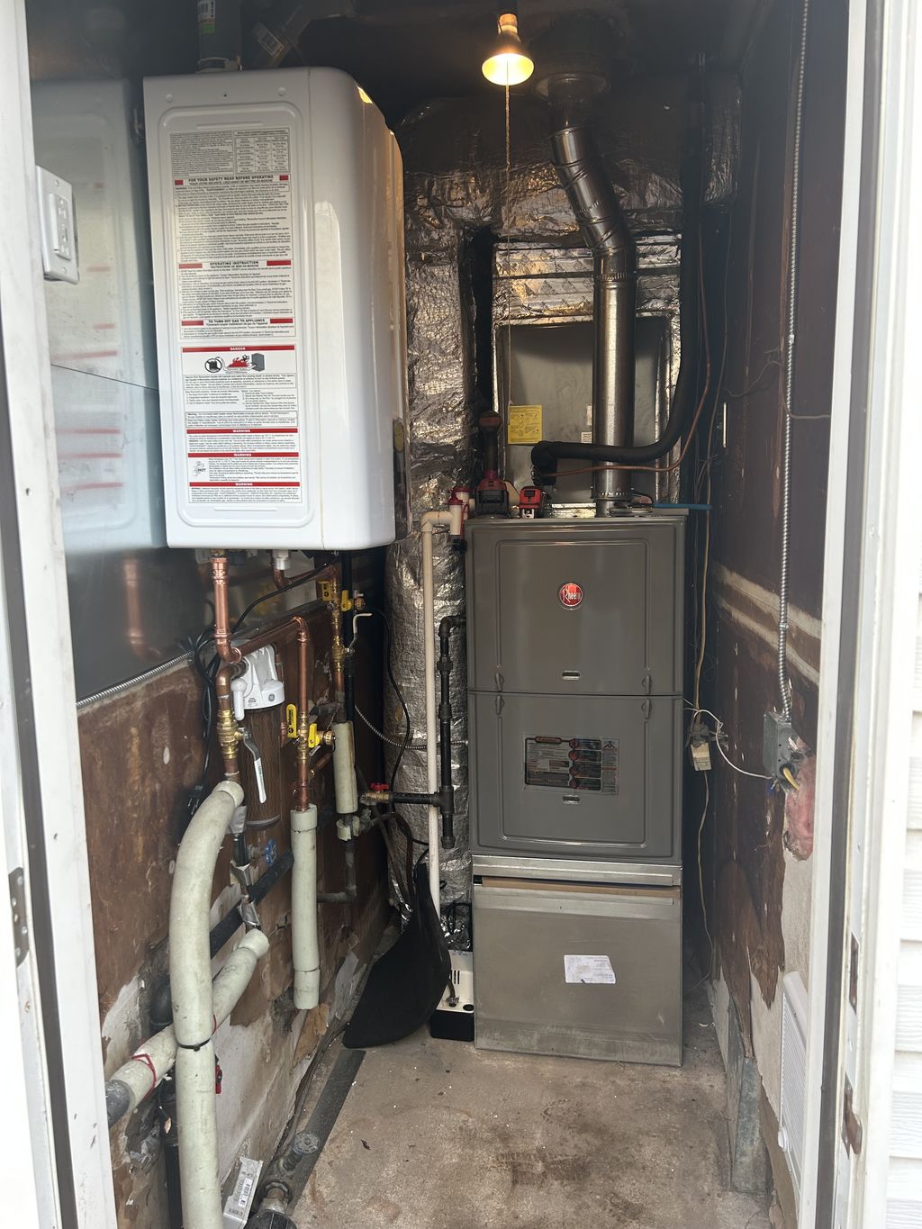 Tankless Navien and a Rheem Furnace with Air Condi
