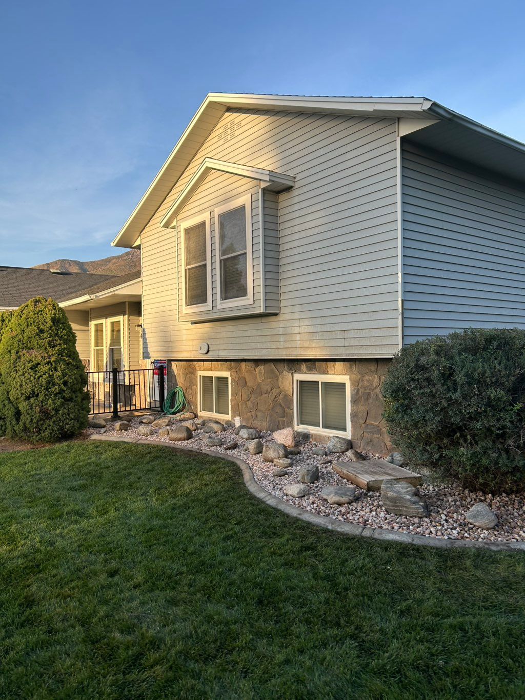 Flower bed remodel after work is completed photo. 