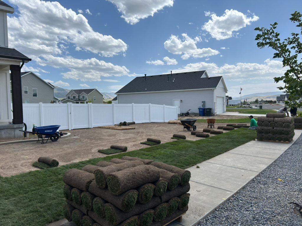 Sod and sprinkler installation. 