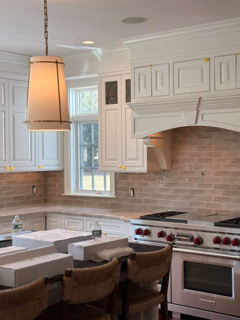 Custom kitchen backsplash tile installation with c