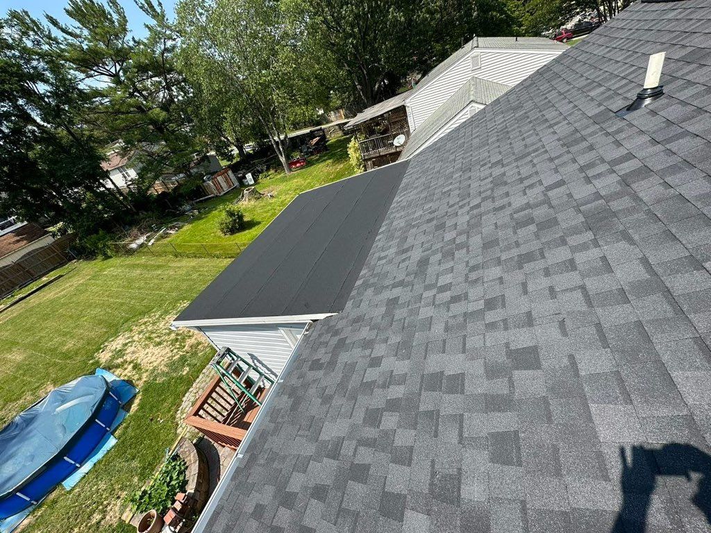 New shingle and flat roof on porch replaced 