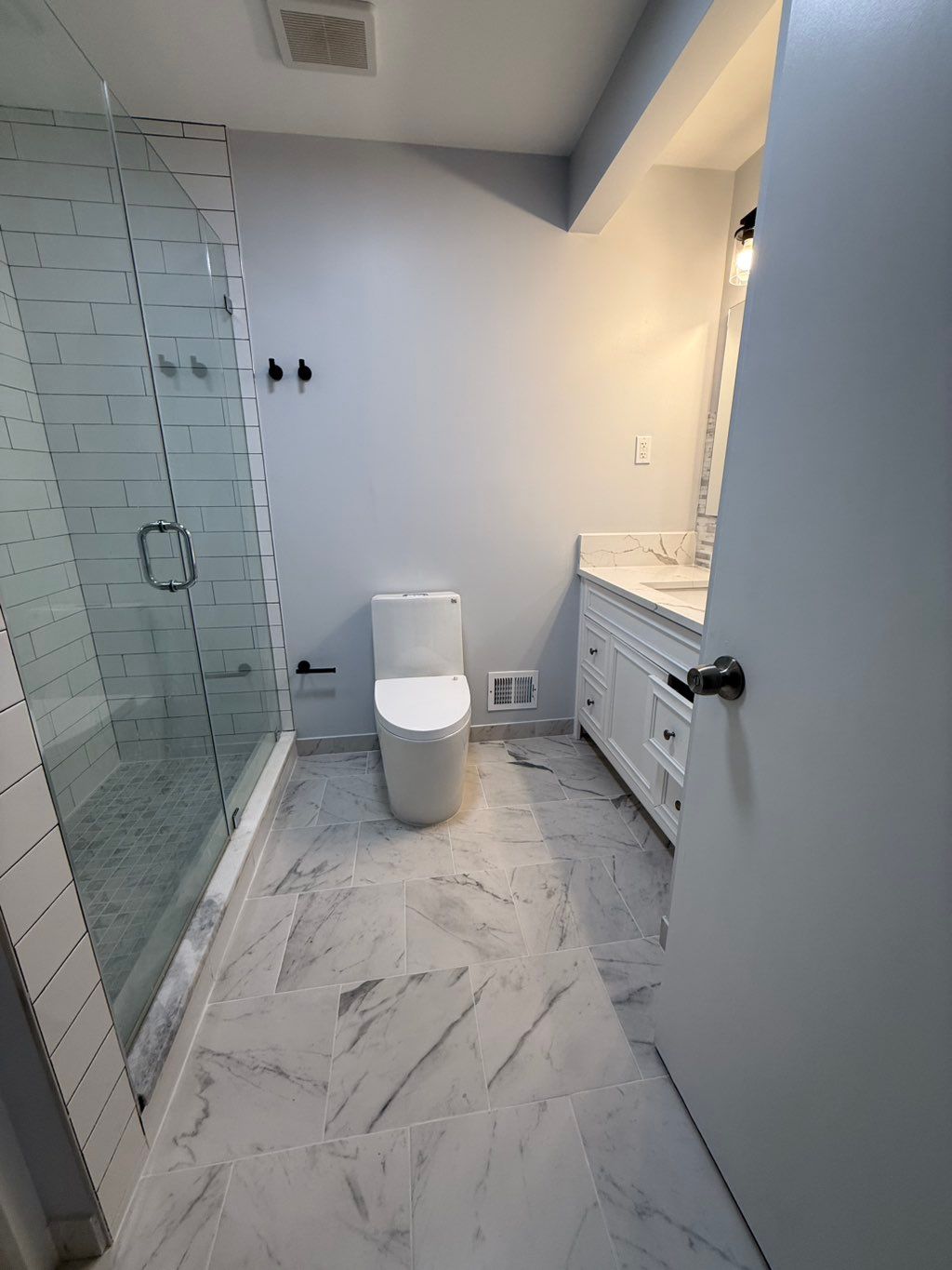 Toilet bidet installation and bathroom floor tile 