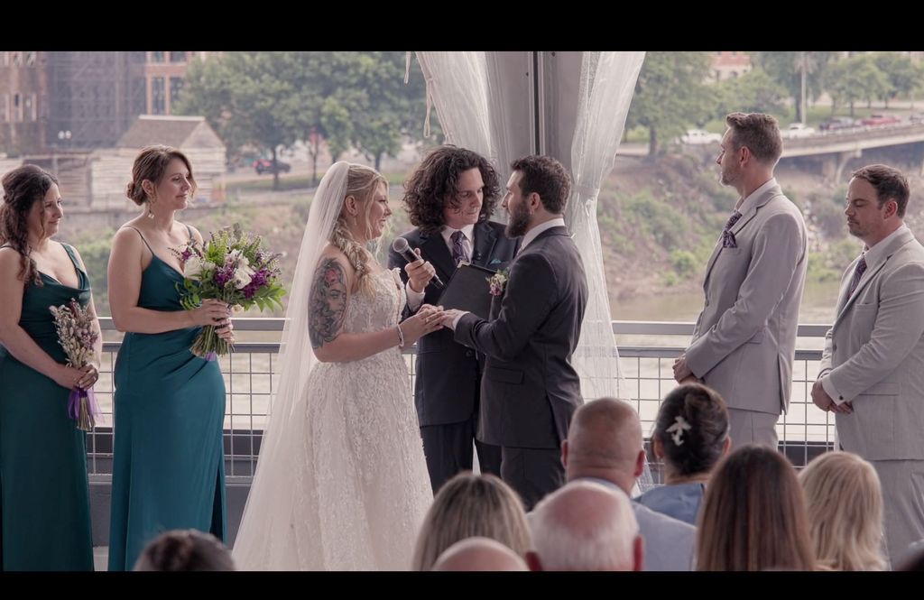 Still from wedding video - Ceremony with downtown 