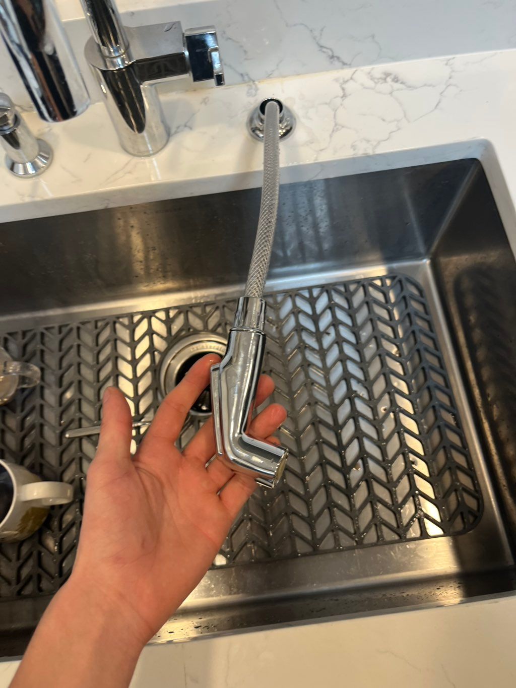 
• Installed new kitchen sink sprayer and connecte