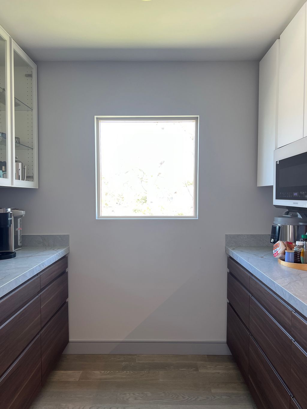 Installed kitchen cabinets, microwave