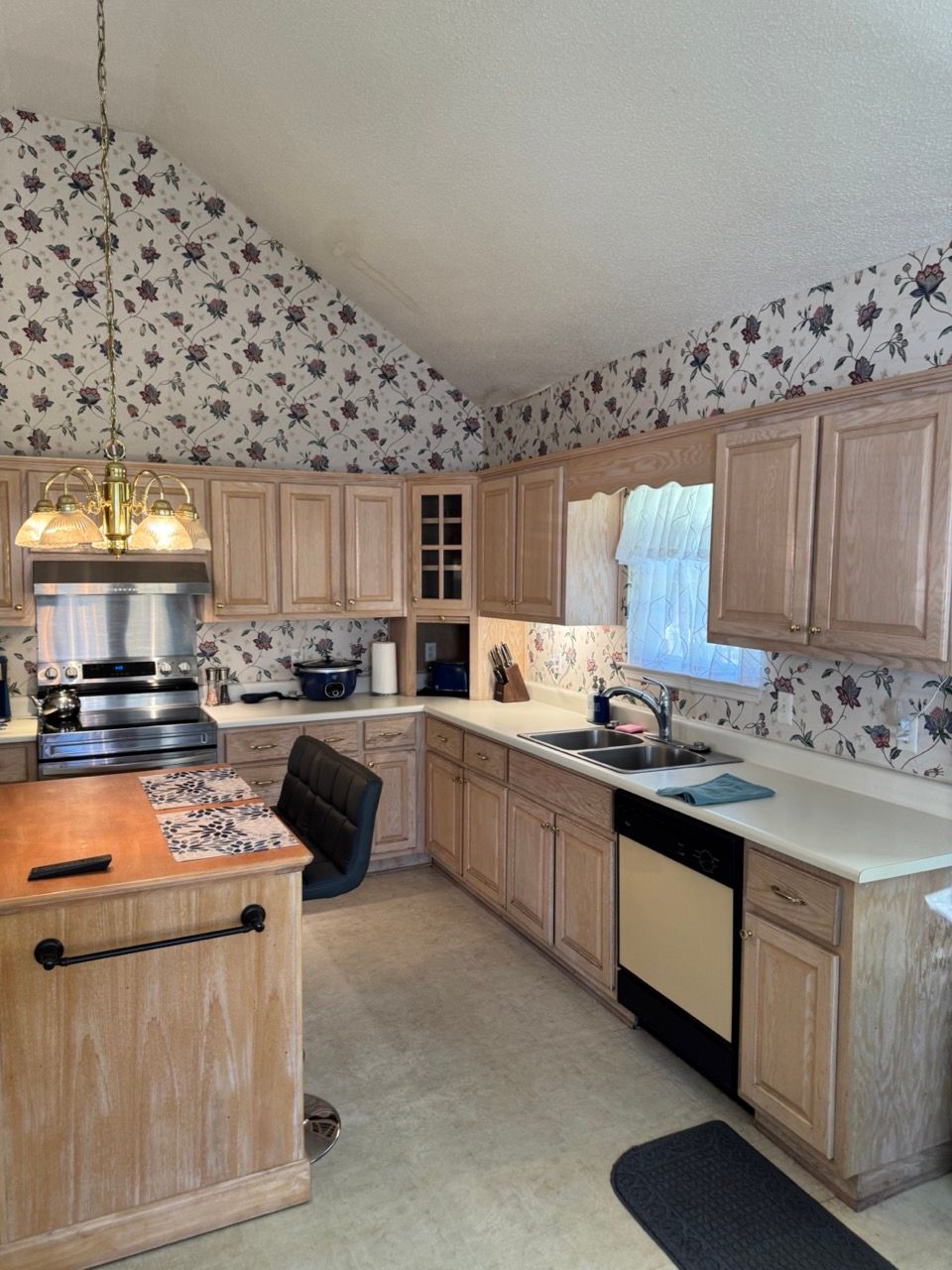 Original wallpaper, counters and island, and exist