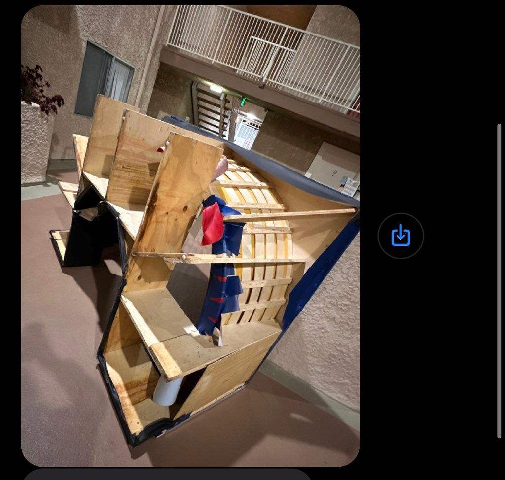 2 flights of stairs through narrow railing 