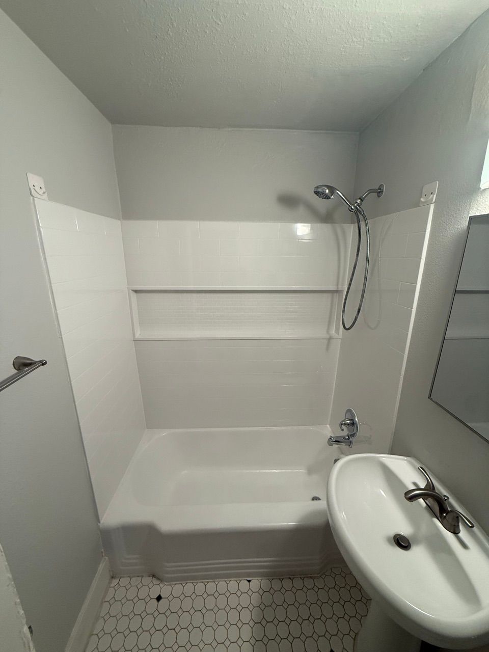After: (Tub/ Fixtures/ Drywall/ Paint)