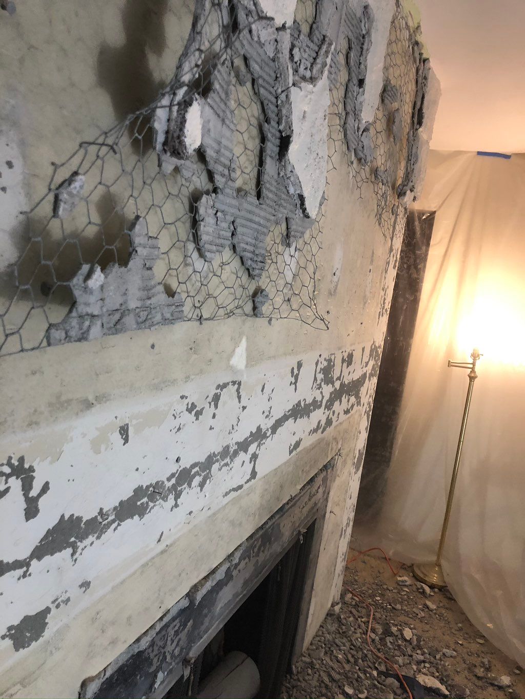 Demo work in progress. This wall had a concrete fa