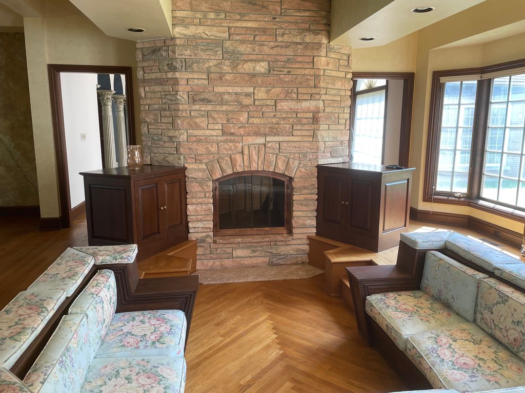 Original sunken fireplace with dated fireplace